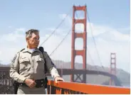  ?? Eric Risberg / Associated Press 2013 ?? As a California Highway Patrol officer, Kevin Briggs talked bridge walkers out of jumping off.