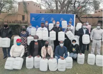 ??  ?? Meropa donated water drums to drop-in centres in the Polokwane area.
