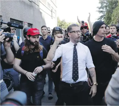  ?? MARCIO JOSE SANCHEZ / THE CANADIAN PRESS ?? Gavin McInnes, seen at a rally in Berkeley, Calif., is the founder of Proud Boys, a far-right group with goofy rules, such as one that bans masturbati­on. They gained notoriety after disrupting an Aboriginal ceremony in Halifax.