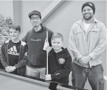  ?? [ALI WILSON / THE OBSERVER] ?? Wade Ogram, youth coordinato­r Fad Akbar, Michael MacDonald and youth worker Brandon Reoch at the recently re-opened Woolwich Youth Centre.