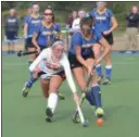  ?? THOMAS NASH - DIGITAL FIRST MEDIA ?? Perkiomen Valley’s Bella Ricci, left, and Downingtow­n East’s Rachel Swink, right, battle for possession.