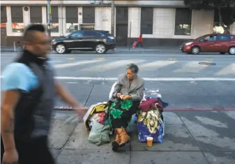  ?? Paul Chinn / The Chronicle ?? Alice, who was persuaded to leave her usual spot at 16th and Mission streets for a drop-in center at the end of last month, left the shelter Sunday and was being looked for Monday.