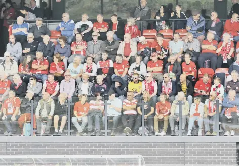  ??  ?? Boro fans take in the action in the main stand