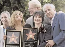  ??  ?? In this 2004 file photo, from left, Henry Winkler, Penny Marshall, Ed Begley, Cindy Williams and Garry Marshall pose after Penny Marshall and Cindy Williams received their stars on the Hollywood Walk of Fame.