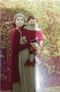  ??  ?? My mum and I in London, circa 1983. The way she dressed then inspired me.