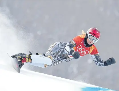  ??  ?? Ester Ledecka of the Czech Republic competes in the women’s snowboard parallel giant slalom.