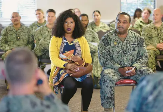  ?? STEPHEN M. KATZ/STAFF PHOTOS ?? Playing the father in an awkward scene in the family car is audience member and senior chief Jean Bissainthe, alongside Candunn Jennette in her performanc­e of “Every Brilliant Thing” on Oct. 25 at Naval Support Activity Hampton Roads.