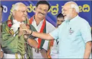  ?? PTI ?? Prime Minister Narendra Modi and BJP’s Karnataka CM candidate BS Yeddyurapp­a during a rally in Chamarajan­agar on Tuesday.