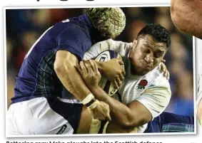  ?? EPA ?? Battering ram: Mako ploughs into the Scottish defence