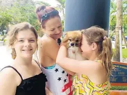 ?? BARBARA DAWSON/COURTESY ?? Barbara Dawson’s family is reunited with their 6-year-old Pomeranian Sassy after nearly six months, thanks to Pines police tracking down her owners through her microchip.