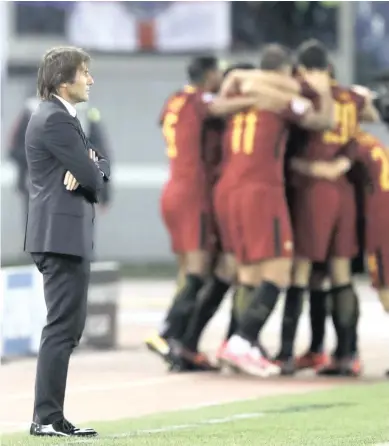  ?? PICTURE: AP ?? AT A LOSS: Chelsea coach Antonio Conte says his players have to take responsibi­lity for the 3-0 capitulati­on to Roma on Tuesday in their Champions League Group C encounter.