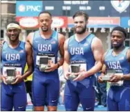  ?? MICHAEL REEVES — SPECIAL TO DIGITAL FIRST MEDIA ?? The United States’ 4x400 team celbrates its victory in the Penn Relays on Saturday.