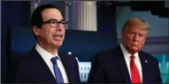  ?? The Associated Press ?? AID DEAL: President Donald Trump listens as Treasury Secretary Steven Mnuchin speaks on April 13 in the James Brady Press Briefing Room at the White House in Washington.