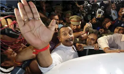  ?? Photograph: Pawan Kumar/Reuters ?? Kuldeep Singh Sengar, a BJP legislator in Uttar Pradesh state, has been in police custody for a year accused of rape.