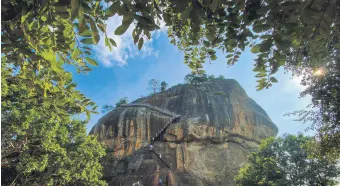  ?? ?? Tourists visit an ancient rock fortress in Sigiriya near Dambulla, Sri Lanka, Feb. 18, 2024.