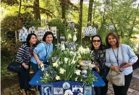  ??  ?? A RIOT OF BLOOMS. Flowers, flowers everywhere, tulips of varied hues at Kuekenhof garden. Happy faces at the garden (from left), writer Nelia G. Neri, Aida Uy, Angelita Dy and Suzette Reyes of Pro Flights Travel-Manila.