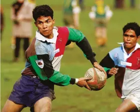  ??  ?? Natural leader: Yunus Hussain in full flow at Rosslyn Park Sevens