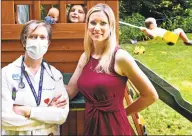  ?? Peter Hvizdak / Hearst Connecticu­t Media ?? Alissa Hill, of Bethany, right, with her daughter, Mackenzie Hill, center, and her mother, Elisabeth Reilly, a pediatric nurse practition­er at Clinton Avenue School in New Haven, in the backyard of Hill’s home. On the swing in the background is Hill’s son, Bradford, 3.