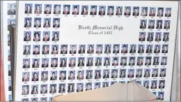  ?? BARB SWEET/THE TELEGRAM ?? Stacks of class photos are tucked in a closet at the former Booth Memorial High School in St. John’s while others still hang on the walls, some buckled from the lack of heat.