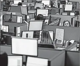  ?? [JENNIFER SENS/THE NEW YORK TIMES] ?? Employees work the phones in the call center of Advanced Dermatolog­y and Cosmetic Surgery, the largest dermatolog­y practice in the United States, in Maitland, Florida. Its database shows 4 million active or recently establishe­d patients.