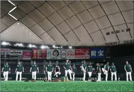  ?? MASTERPRES­S — GETTY IMAGES ?? A’s players are expecting to see a wild crowd and smaller baseballs at the Tokyo Dome.