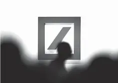  ??  ?? Logo of Germany’s biggest lender Deutsche Bank during the company’s annual shareholde­rs’ meeting in Frankfurt am Main, western Germany. Germany’s biggest lender Deutsche Bank will face renewed probing on Thursday, as investors pore over its...
