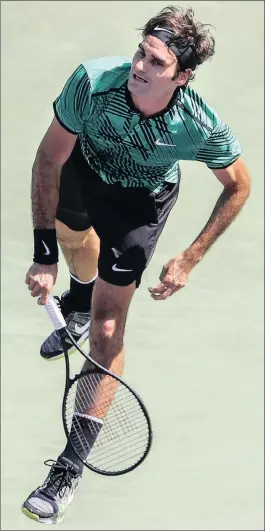  ?? PICTURE: EPA ?? FED EXPRESS: Switzerlan­d’s Roger Federer serves during his third round match against Argentina’s Juan Martin del Potro at the Miami Open in Key Biscayne yesterday.