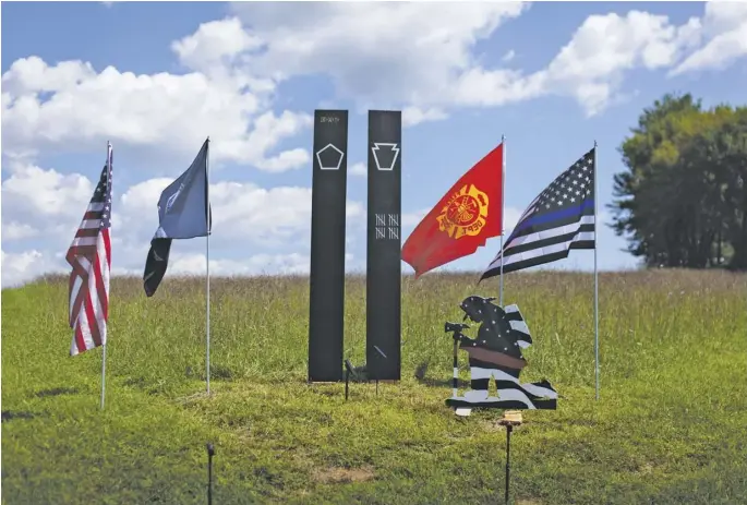  ?? BY LUKE CHRISTOPHE­R ?? A September 11 memorial at the Silo at Sperryvill­e this week.