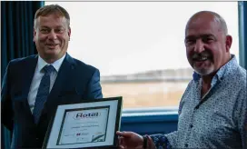  ??  ?? LEFT: Sales and Marketing Manager Miriam Ferriter. ABOVE: Dingle Skellig Hotel General Manager Graham Fitzgerald accepts the Irish Family Hotel of the Year Award from Irish Hotel Awards Director Shane Smith.