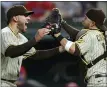  ?? RONALD MARTINEZ — GETTY IMAGES ?? Joe Musgrove (44) of the San Diego Padres celebrates with Victor Caratini (17) after pitching a no-hitter against the Texas Rangers at Globe Life Field on Friday in Arlington, Texas.