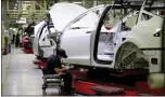  ?? STAFF ARCHIVES ?? The Tesla factory in Fremont is making preparatio­ns to hire workers for more production.