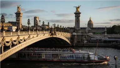  ?? JOANN PAI THE NEW YORK TIMES ?? The Pont Alexandre III, built for the Paris Exposition Universell­e of 1900, is arguably the most elegant bridge in Paris.