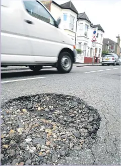  ?? Picture: PA ?? RISKY: Potholes are the depth of 167 double deckers