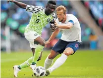  ?? Picture: REUTERS ?? UNITED FORCE: England’s Harry Kane, seen here in action with Nigeria’s Oghenekaro Etebo, says they will give their all in Russia