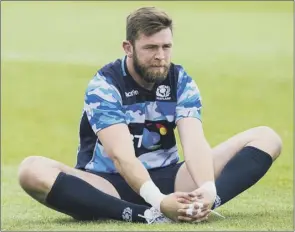  ?? Picture:sns ?? Scotland flanker Ryan Wilson stretches off after a training session
