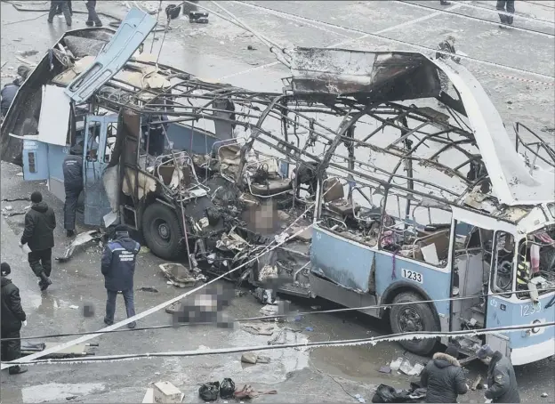  ?? Picture: Reuters ?? at least 14 people died in yesterday’s bombing in volgograd, where much of a bus’s exterior was ripped away and windows shattered in nearby buildings