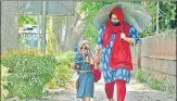  ?? RAJ K RAJ /HT PHOTO ?? A mother-daughter duo walks down Mandi House.
