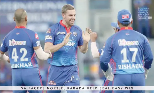  ?? — BCCI ?? Anrich Nortje of Delhi Capitals celebrates the wicket of David Warner of Sunrisers Hyderabad.