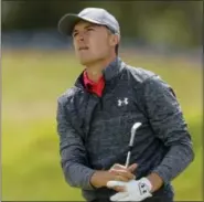  ?? ALASTAIR GRANT — THE ASSOCIATED PRESS ?? Jordan Spieth plays a shot on the 18th hole.