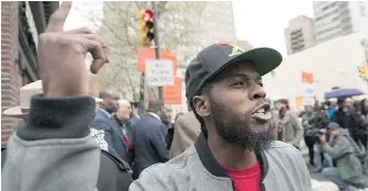  ??  ?? Protesters gather outside the Starbucks in Philadelph­ia.