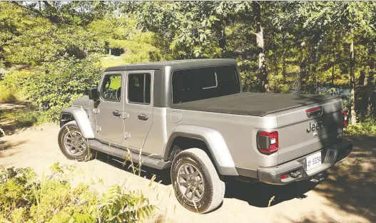  ?? PHOTOS: CLAYTON SEAMS/DRIVING ?? The 2019 Jeep Gladiator captures the best of both worlds: It’s designed for commuting to work on weekdays and hitting remote backwoods on weekends.