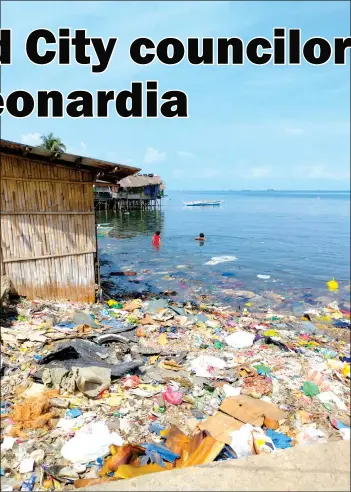  ??  ?? Garbage can be seen amassed along the coastline of the Boulevard section of Barangay 16 in Bacolod City. Despite the unsanitary accumulati­on, the area continues to be a spot for local children to go swimming.