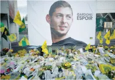  ?? — Reuters ?? General view of tributes left outside the stadium for Emiliano Sala.