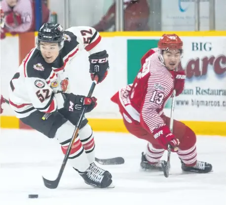  ?? SUPPLIED PHOTO ?? Niagara Falls Canucks defenceman Ryan Mooney, No. 52, in action against the the St. Catharines Falcons in this file photo.