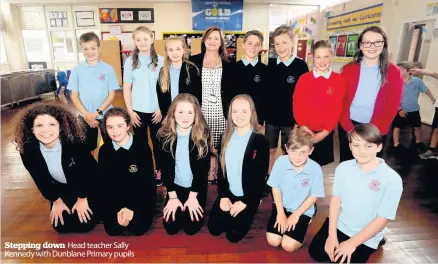  ??  ?? Stepping down Head teacher Sally Kennedy with Dunblane Primary pupils