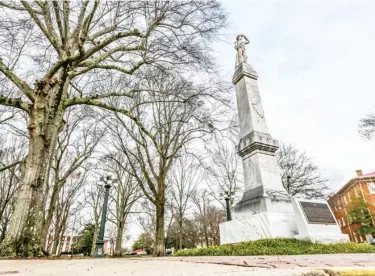  ??  ?? The Confederat­e statue is located in the Circle at the University of Mississipp­i, in Oxford, Miss. on Thursday, January 16, 2020. The Mississipp­i Institutio­ns of Higher Learning Board of Trustees on Thursday decided to delay voting on the request to relocate the Confederat­e statue to a Confederat­e statue on campus. (Photo by Bruce Newman, The Oxford Eagle via AP)