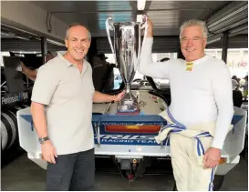  ??  ?? Below: Russell with Wayne Park co-driver (left), winners of Daytona 24-hour classic Group C