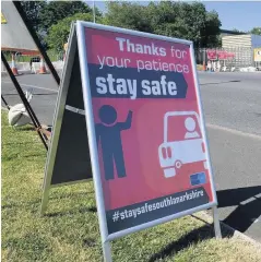  ??  ?? Sign of the times Boards are in place to keep people safe at tips