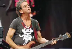  ??  ?? In this Sunday file photo, Lou Reed performs at the Lollapaloo­za music festival, in Chicago. — AP
