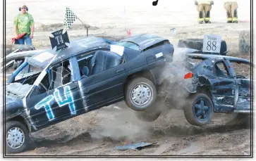  ?? Donnis Hueftle-Bullock ?? Engines roar and cars fly at the 2016 Demolition Derby at the Custer County Fairground­s. The Custer County Ag Society has voted to partner with the Broken Bow Chamber of Commerce to bring the demo derby back to the fairground­s this summer. See article at left.